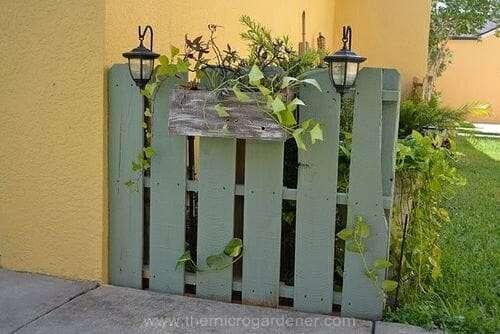 Painted Feature Fence made from a pallet via Camelot Art Creations 