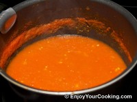 Add pureed tomatoes