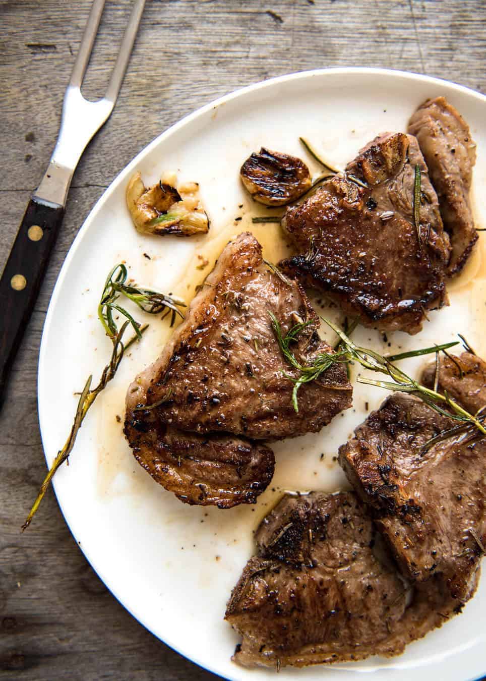Rosemary Garlic Grilled Lamb Chops - A simple marinade infuses this with fantastic flavour! Use the marinade for any quick-cooking cut of lamb - chops or steaks. recipetineats.com
